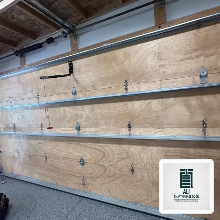 Off-Track Garage Door Emergency Realignment & Laser Calibration in Lynn, MA